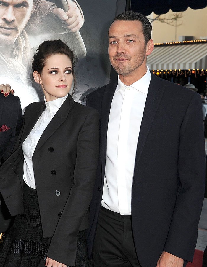 Kristen Stewart in a black suit hints at a deeper reason behind her possible exit from the US during an event.