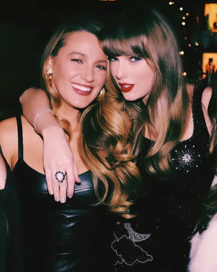 Blake Lively and Taylor Swift posing together at an event, related to Taylor Swift's wedding to Travis Kelce news.