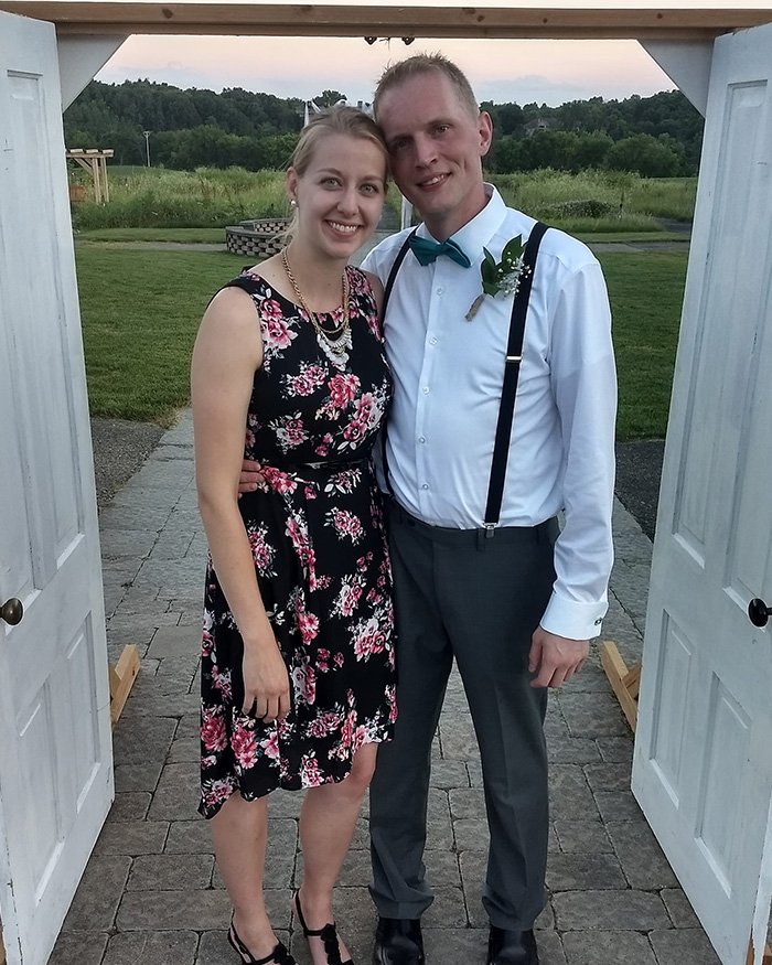 Couple posing outdoors at sunset dressed formally, linked to man admitting horrific charges in pregnant sister’s homicide case.