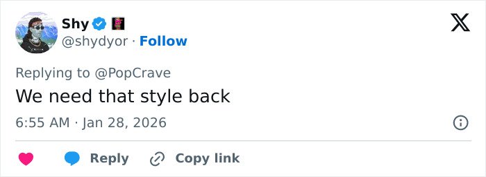 Fan reply on social media expressing desire for Ariana Grande’s style with big sweatshirts and thigh-high boots.