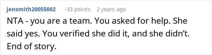 Screenshot of a Reddit comment discussing a man blaming his wife for having no slacks for his business trip.
