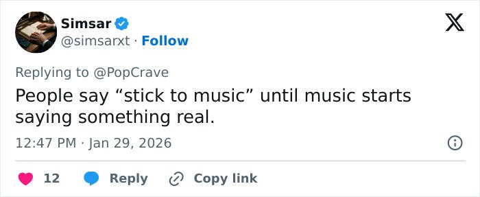 Tweet by Simsar replying to PopCrave about music saying something real, related to Lady Gaga bold ICE speech at concert.