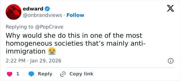 Screenshot of a social media reply discussing Lady Gaga halting concert to deliver a bold ICE speech on immigration.