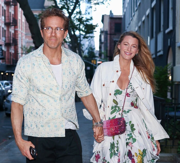 Blake Lively and Ryan Reynolds holding hands on city street amid leaked audio bombshell controversy with fans