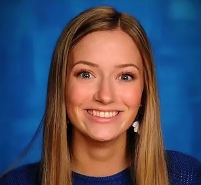 Young woman with long blonde hair smiling in a portrait representing bold texts from teacher to student after hours