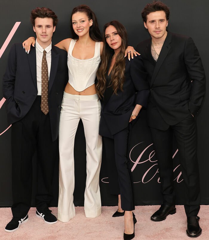 Cruz Beckham with family members at an event, reflecting on Brooklyn’s claim about mom Victoria’s wedding dance.