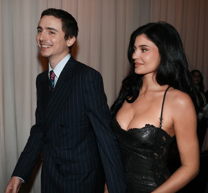 Timothée Chalamet and Kylie Jenner at an event, highlighting Kylie’s BBL as video goes viral online.
