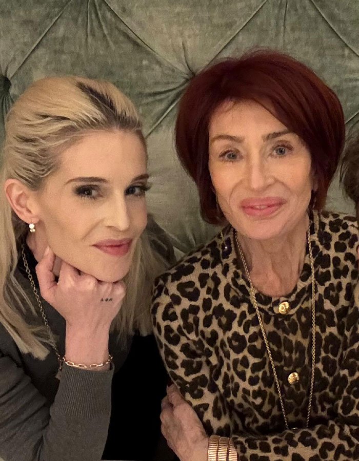 Two women seated together, one with blonde hair, the other in leopard print, highlighting Osbournes drastic weight loss.