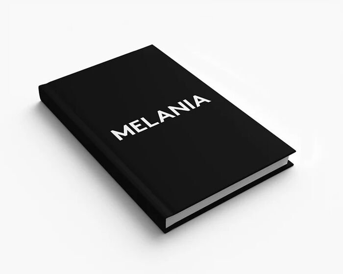 Black hardcover book titled Melania on a white surface representing Melania reveals the age gap in dating Trump.