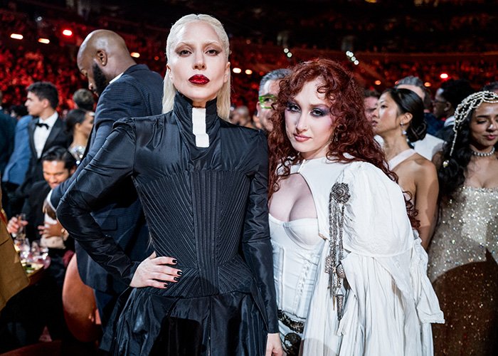 Two stylish attendees at the Grammy event highlighting the strict rules Grammy seatfillers face during the ceremony.