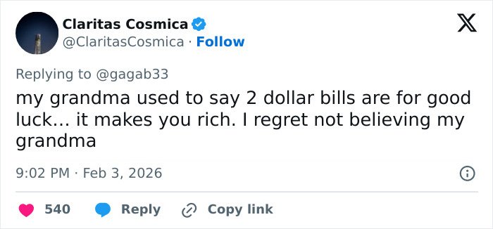 Tweet discussing the superstition and good luck associated with celebrities spotted with $2 bills at the Grammys.