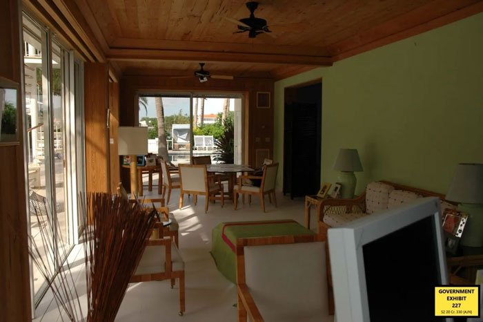 Interior of a living room with wooden ceiling and furniture related to exotic dancer’s shocking allegations against Epstein and ex-Prince Andrew.