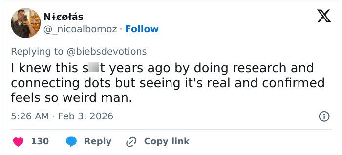 Twitter reply text discussing disturbing theory linking Justin Bieber to Epstein after fans connect Yummy music video to email.