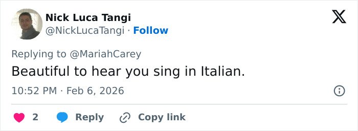Screenshot of a tweet praising Mariah Carey's Italian singing during her 2026 Winter Games opening ceremony performance.