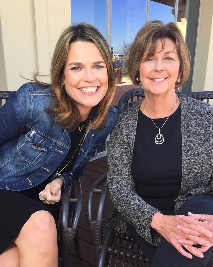 Two women sitting closely smiling outdoors, relevant to FBI official and Nancy Guthrie's disappearance case discussion.