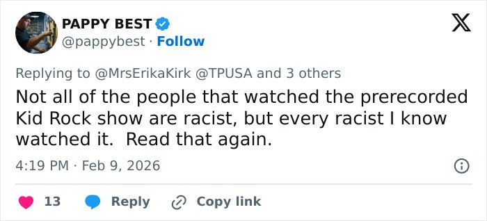 Screenshot of a tweet responding to Erika Kirk about Turning Point USA's alternate halftime show controversy.