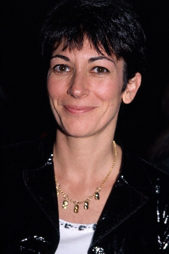 Close-up portrait of Ghislaine Maxwell with short hair and a gold necklace, related to Epstein investigation and FBI docs.