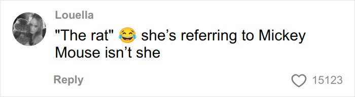 User comment with laughing emoji discussing Mickey Mouse, related to Disneyland Evil Queen controversial firing topic.