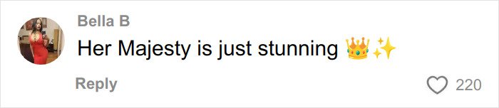 Comment on social media praising a woman as stunning with crown and sparkle emojis, related to Disneyland Evil Queen topic.