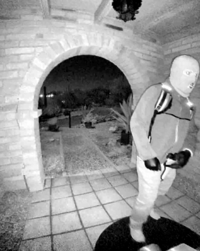 Masked intruder caught on doorbell camera, related to Nancy Guthrie ransom note demanding bitcoin payment.