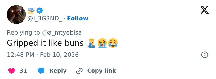 Tweet reaction to low-cut dress advertisement going viral for all the wrong reasons, featuring emojis and casual tone.