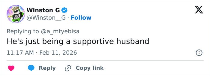 Tweet screenshot showing a user commenting on a low-cut dress advertisement that went viral for all the wrong reasons.