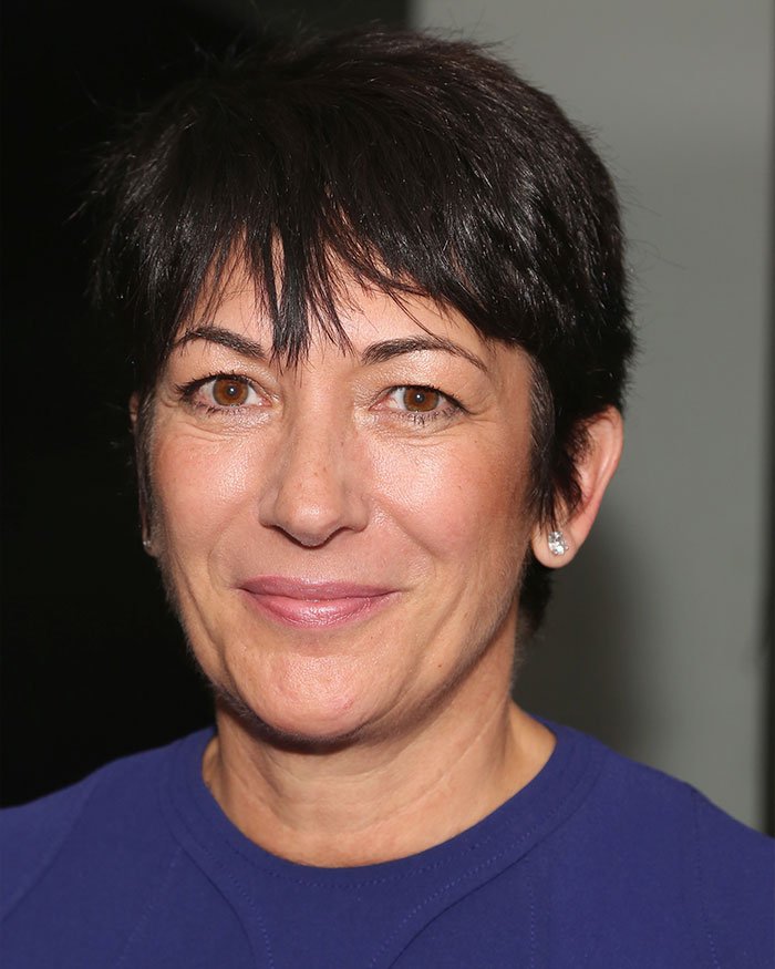 Close-up of Ghislaine Maxwell with short dark hair and brown eyes in a blue top, related to Madeleine McCann abductor sketch debate.
