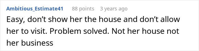 Screenshot of a social media comment suggesting to prevent in-laws from visiting, addressing concerns about new parents’ home.