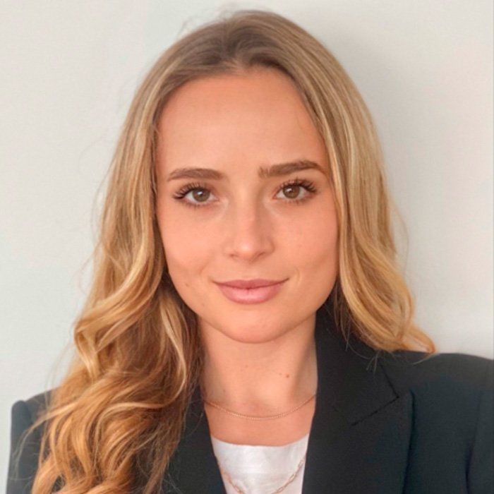 Young woman with long blonde hair wearing a black blazer, illustrating Epstein obsession with ex-girlfriend's daughter topic.