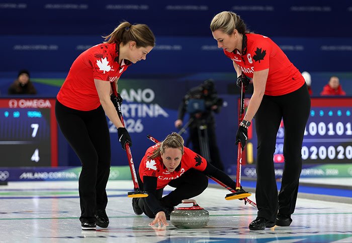 Canadian curling team competing in the Olympics during a match amid cheating accusations from multiple countries.