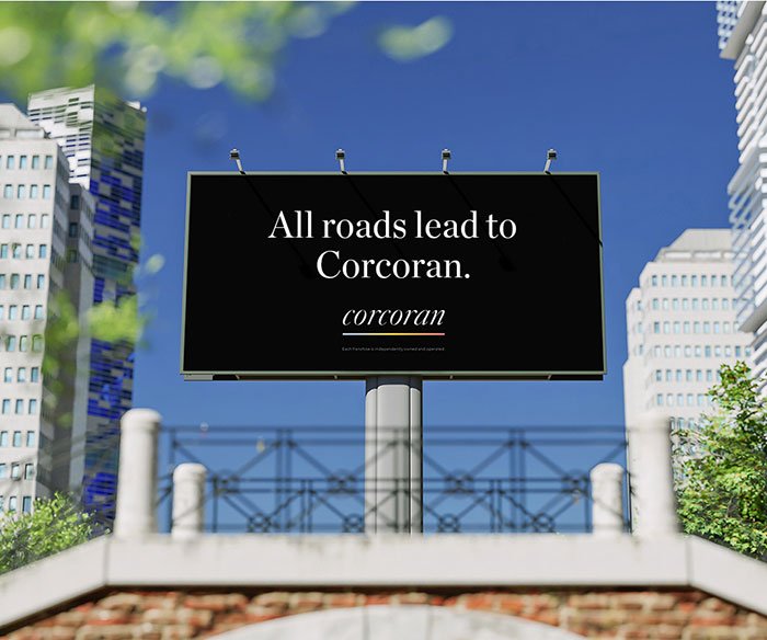 Billboard in an urban setting with trees and buildings, unrelated to Erika Kirk Epstein link conspiracy theories.