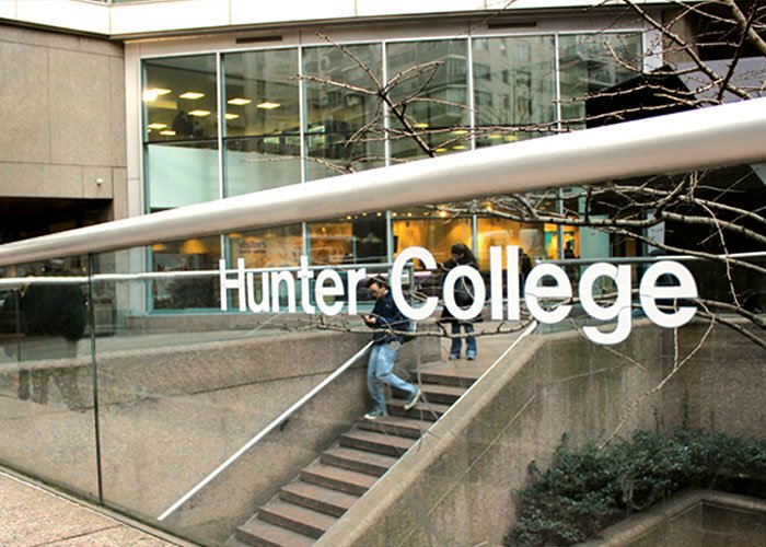 Hunter College entrance with students on stairs, related to teacher’s abhorrent hot-mic moment causing outrage among students.
