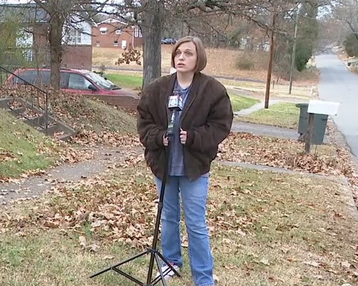 North Carolina mom of three standing outdoors during a news interview about her disappearance and family abandonment.