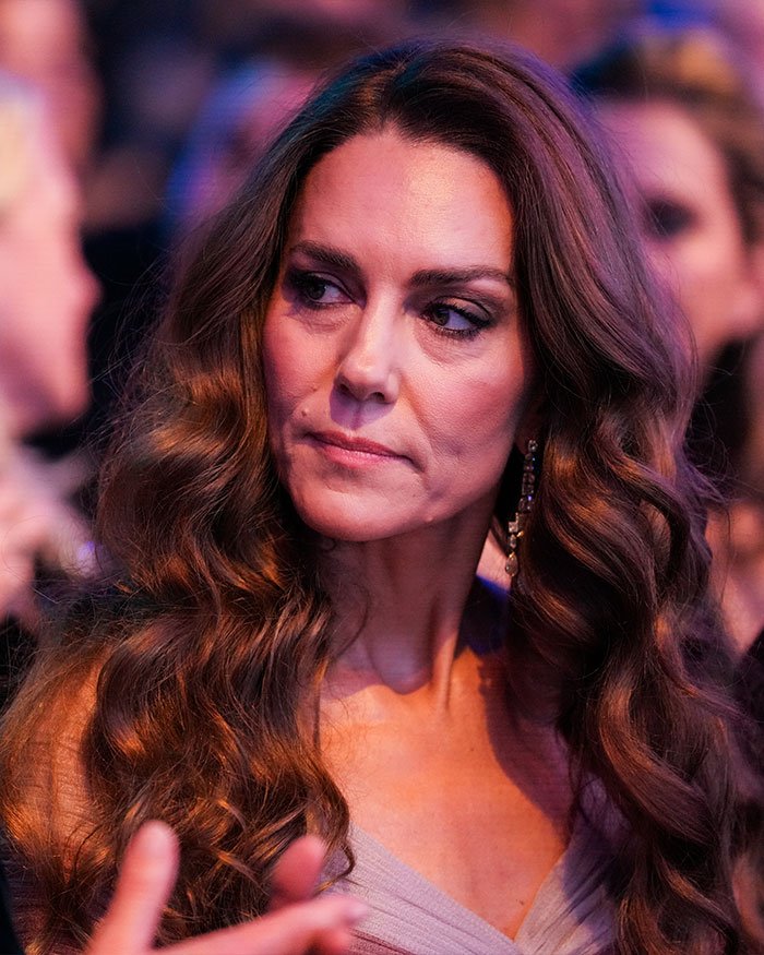 Kate Middleton with a tense expression at the BAFTAs, captured during a lip reader's analysis moment with Prince William.