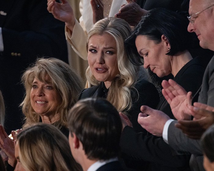 Erika Kirk reacting emotionally at the State of the Union as people notice what she mouthed during Trump's mention.