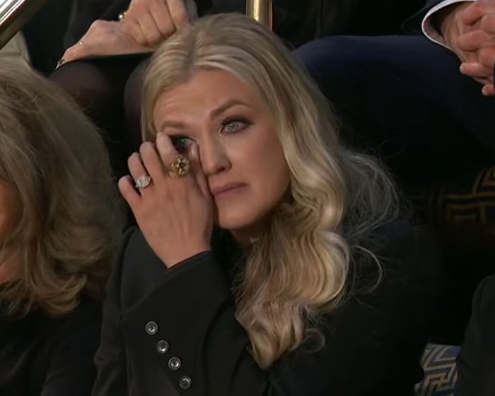 Erika Kirk wiping away a tear during the State of the Union as Trump mentions her, drawing viral attention online.