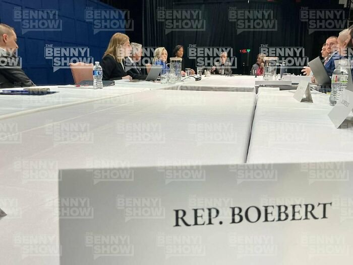 Congress members seated around a table during a clash involving Hillary Clinton's Epstein claim about Trump and Bill Clinton.