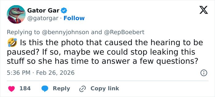 Screenshot of a Twitter reply discussing a paused hearing linked to Hillary Clinton's Epstein claim about Trump.