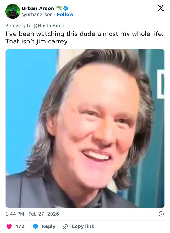 Man with medium-length hair smiling in viral footage, sparking fans' debate about Jim Carrey identity confusion.