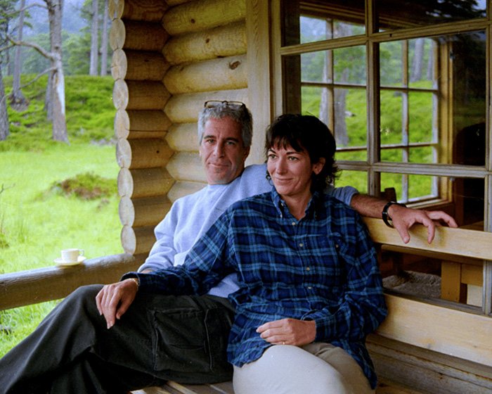 Man and woman sitting on a wooden porch in a rustic cabin, representing Bill Clinton’s fiery statement on Epstein ties.