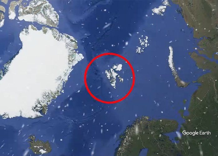 Satellite view of the world’s darkest island in the Arctic region, highlighting its remote location and surrounding waters.