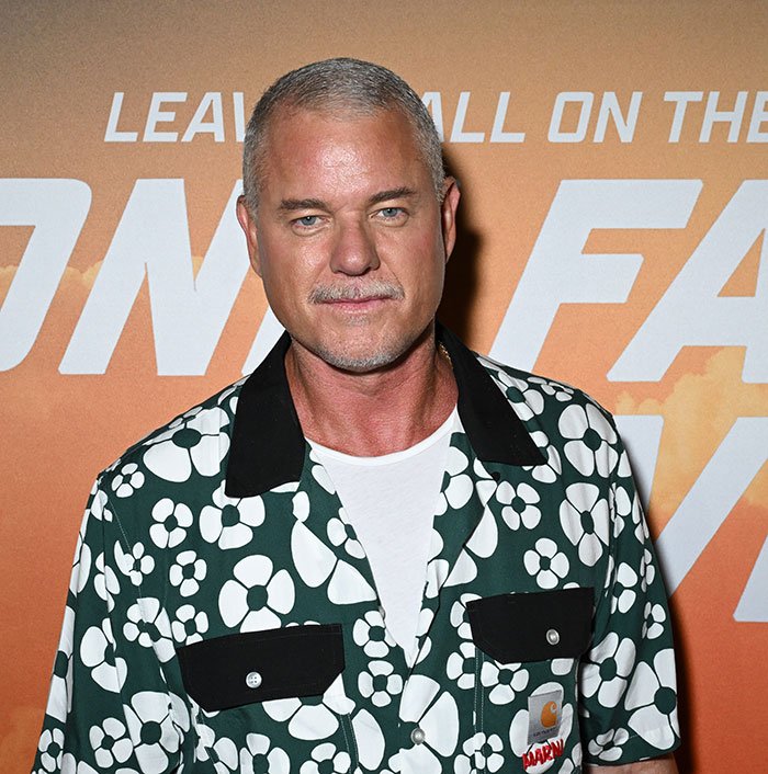 Man in floral shirt at event, related to doctors breaking down commonly ignored ALS symptoms and Eric Dane’s hand claim.