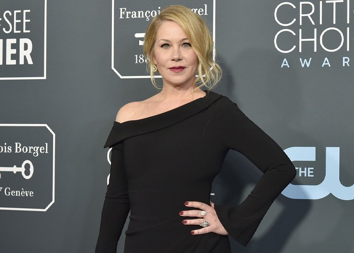 Christina Applegate at an awards event, highlighting doctors breaking down ignored signs of MS awareness.