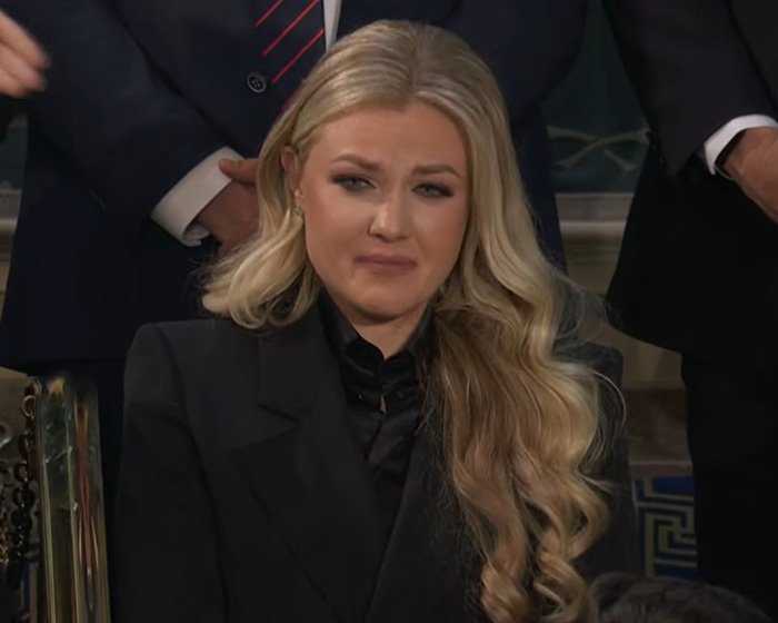 Erika Kirk reacting emotionally as Trump mentions her during the State of the Union address, capturing viral moment.