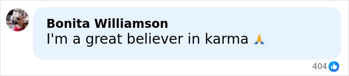 Screenshot of a social media comment stating belief in karma with a praying emoji and 404 likes.