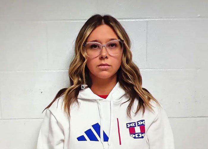 School employee wearing glasses and white hoodie breaking down during confession after being caught in disturbing act