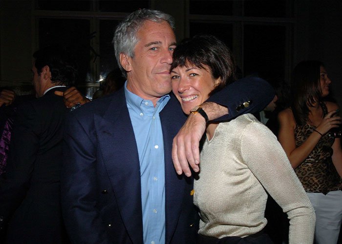 Man in blue blazer and woman in beige top posing closely at an event, related to Ghislaine Maxwell and Madeleine McCann abductor sketch debate.