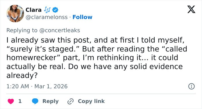 Tweet screenshot showing a user discussing the possibility of a staged incident involving a singer pushed off stage at the Brit Awards.