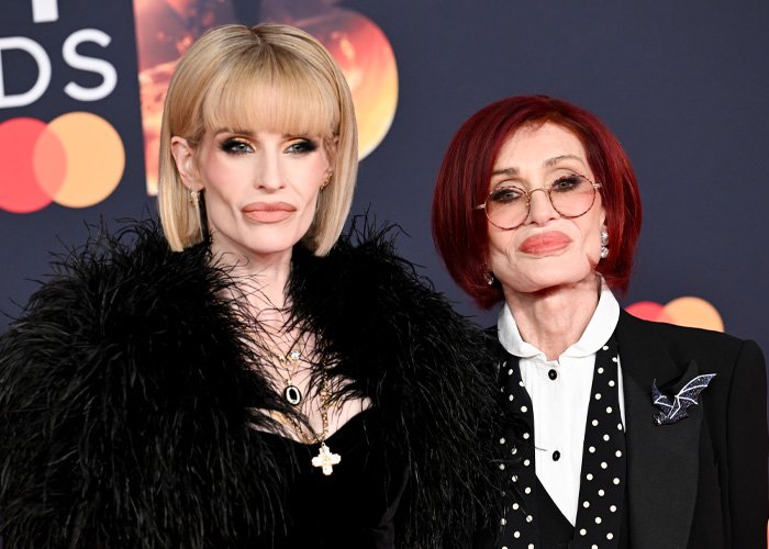 Kelly Osbourne at Brit Awards with fans discussing possible buccal fat removal and her viral red carpet look.